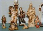 A collection of small figurative wooden carvings