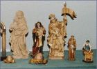 A collection of small figurative wooden carvings